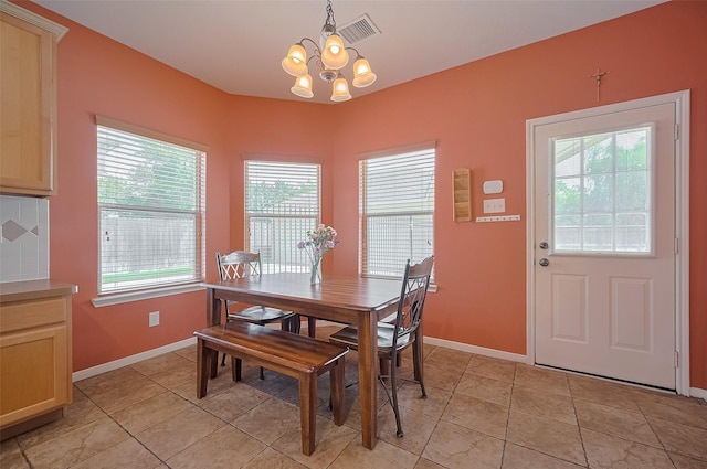 24922 Falcon Hollow Ln, Katy, TX 77494 - dining area featuring a chandelier and light tile patterned floors