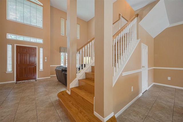 24922 Falcon Hollow Ln, Katy, TX 77494 - entryway featuring a high ceiling and stairway