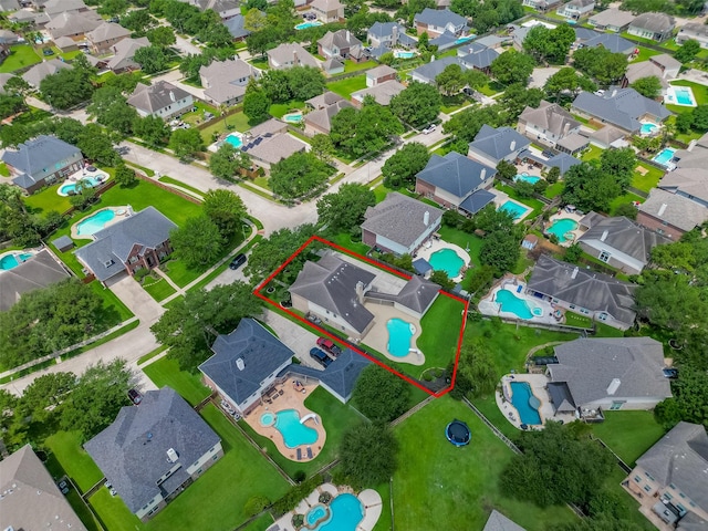 24922 Falcon Hollow Ln, Katy, TX 77494 - aerial view of residential area featuring a pool area and property parcel outlined