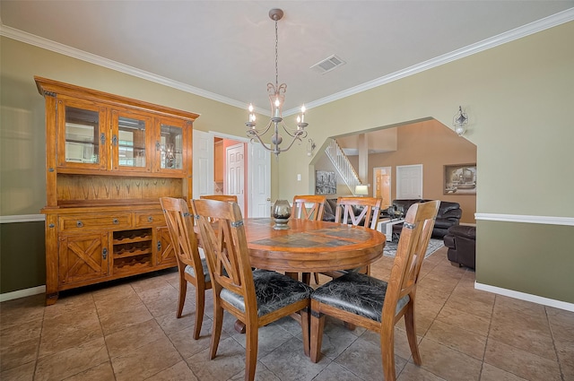 24922 Falcon Hollow Ln, Katy, TX 77494 - dining space featuring a chandelier and ornamental molding