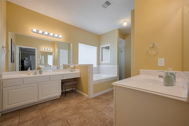 24922 Falcon Hollow Ln, Katy, TX 77494 - bathroom with a bath, two vanities, and a shower stall