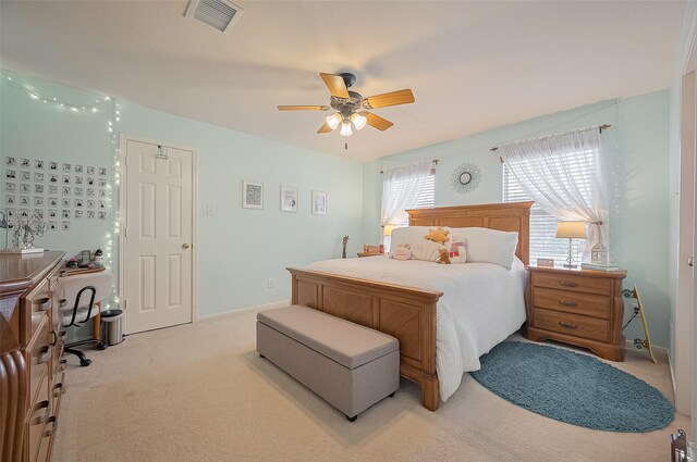 24922 Falcon Hollow Ln, Katy, TX 77494 - bedroom featuring light colored carpet and a ceiling fan