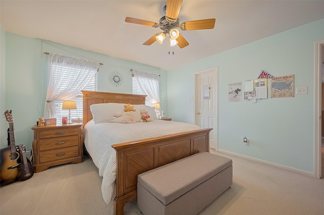 24922 Falcon Hollow Ln, Katy, TX 77494 - bedroom featuring light carpet and a ceiling fan
