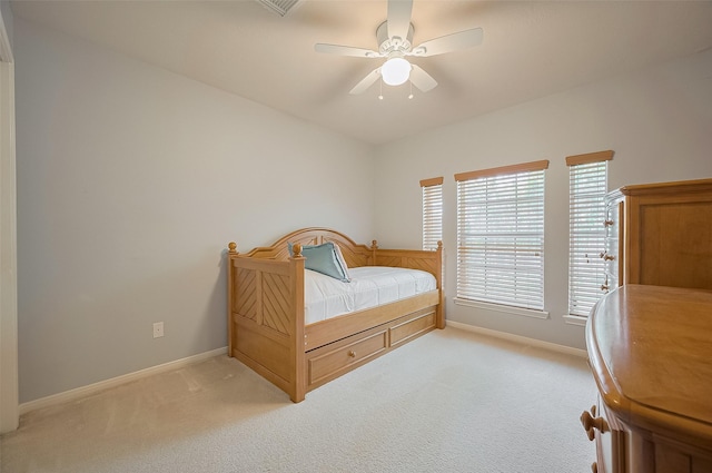 24922 Falcon Hollow Ln, Katy, TX 77494 - bedroom featuring light carpet and a ceiling fan