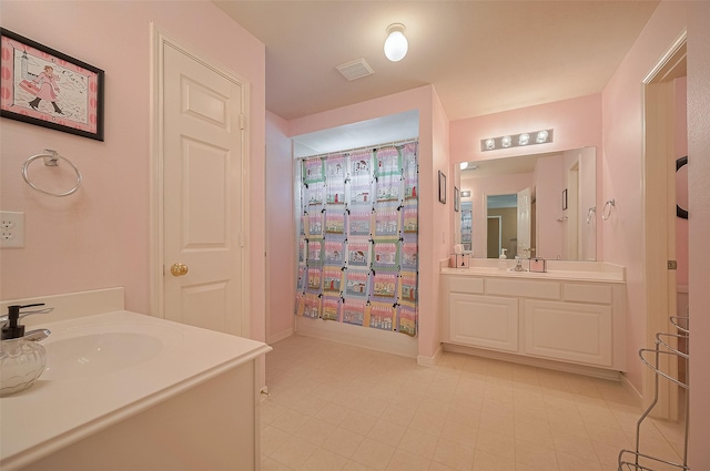 24922 Falcon Hollow Ln, Katy, TX 77494 - bathroom with vanity and tile patterned flooring