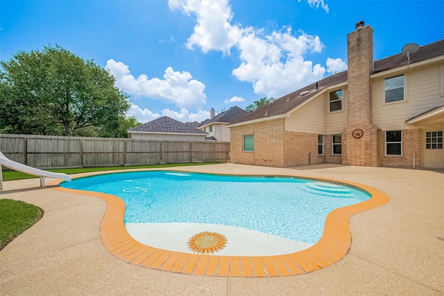 24922 Falcon Hollow Ln, Katy, TX 77494 - view of pool with a water slide and a patio area