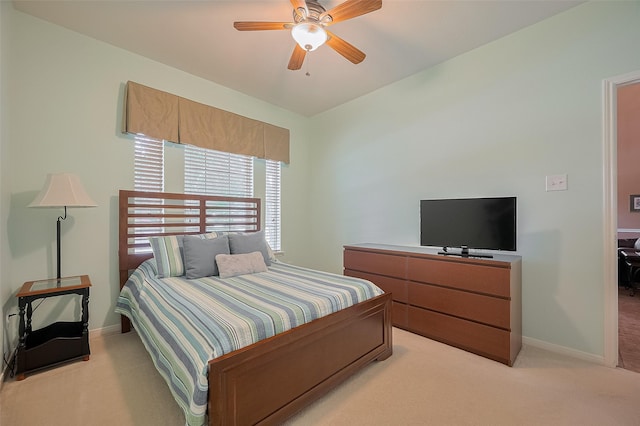24922 Falcon Hollow Ln, Katy, TX 77494 - bedroom with light colored carpet and a ceiling fan