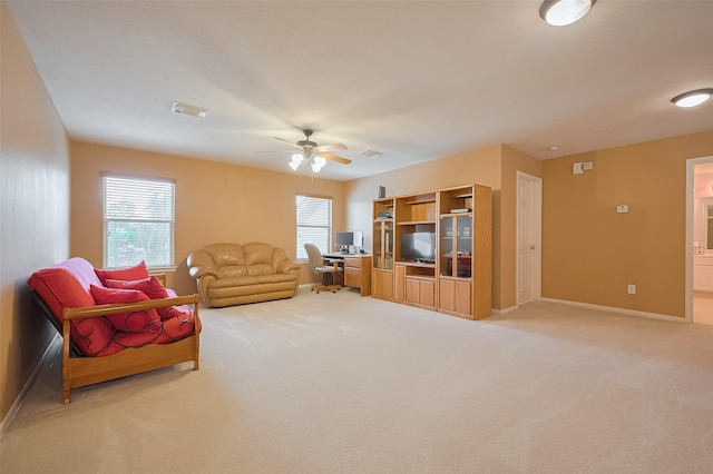 24922 Falcon Hollow Ln, Katy, TX 77494 - living room with an office area, light carpet, and a ceiling fan