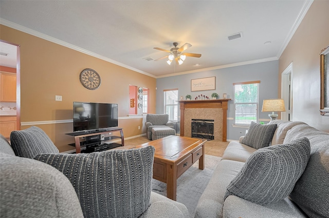 24922 Falcon Hollow Ln, Katy, TX 77494 - living area with a ceiling fan, crown molding, and a fireplace