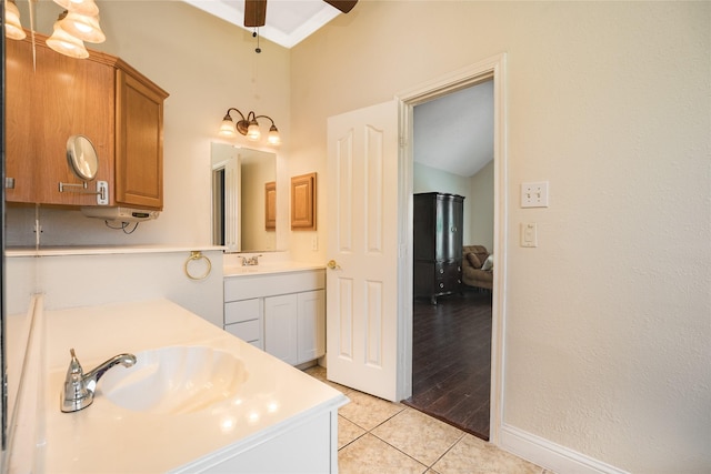 1201 Coryell St, League City, TX 77573 - bathroom with ceiling fan, vanity, and tile patterned floors