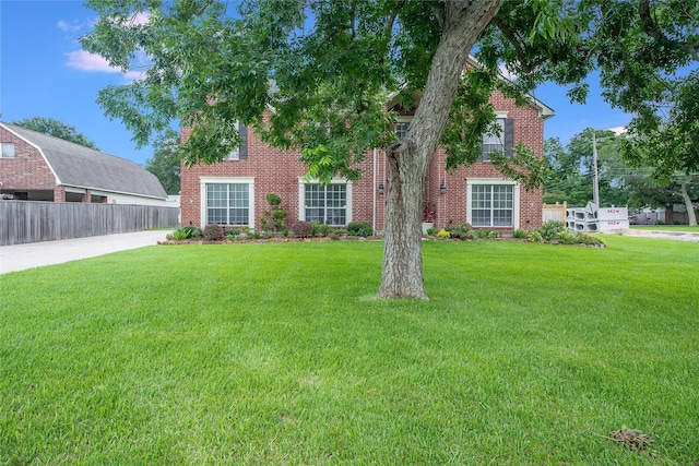 1201 Coryell St, League City, TX 77573 - view of property hidden behind natural elements featuring brick siding