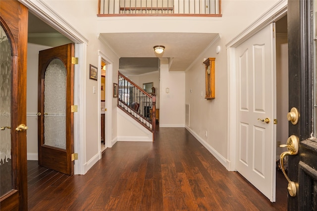 1201 Coryell St, League City, TX 77573 - entryway featuring crown molding, wood finished floors, and stairs