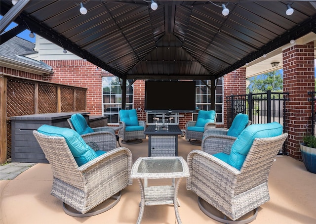 1201 Coryell St, League City, TX 77573 - view of patio / terrace featuring a gazebo and an outdoor living space