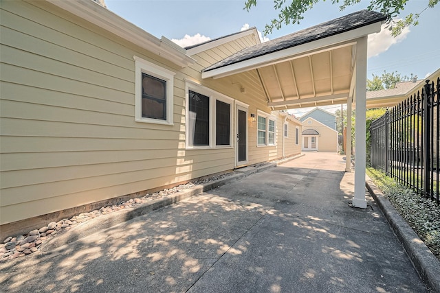 826 Heights Blvd, Houston, TX 77007 - view of patio / terrace featuring concrete driveway and an attached carport