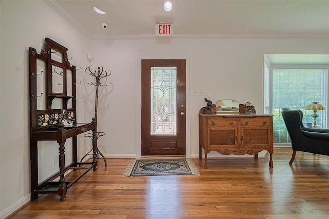 826 Heights Blvd, Houston, TX 77007 - entrance foyer with ornamental molding and light wood-style floors
