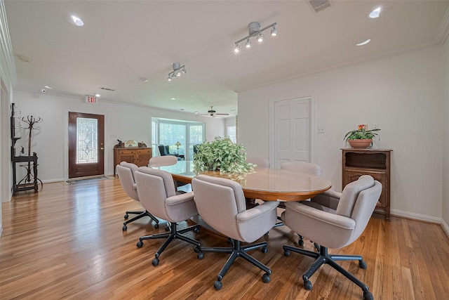 826 Heights Blvd, Houston, TX 77007 - dining area with crown molding, light wood-style flooring, and recessed lighting