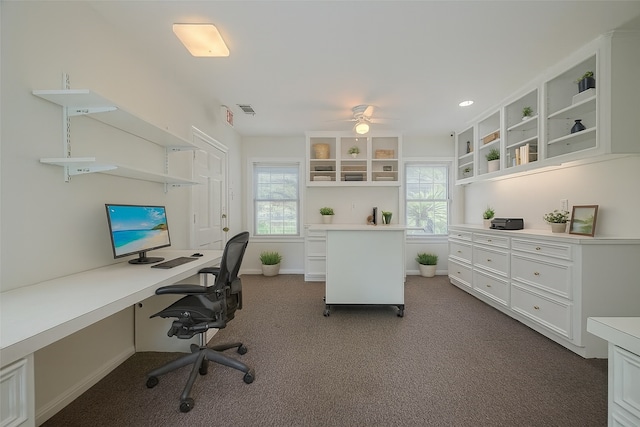 826 Heights Blvd, Houston, TX 77007 - office area featuring a ceiling fan and dark carpet