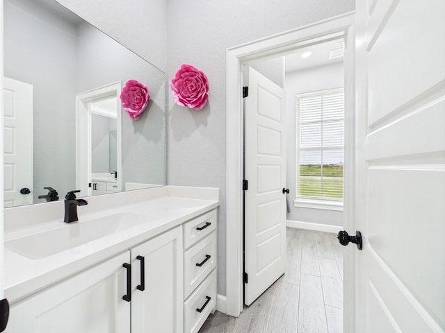 2711 Oakwood Shores Dr, Richwood, TX 77515 - bathroom with vanity and baseboards