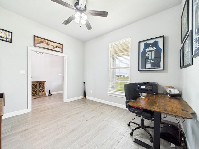 2711 Oakwood Shores Dr, Richwood, TX 77515 - home office with light wood finished floors and a ceiling fan