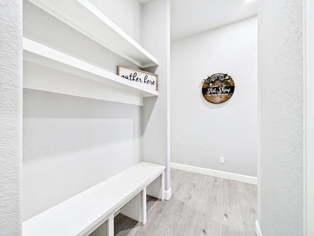 2711 Oakwood Shores Dr, Richwood, TX 77515 - mudroom featuring wood finished floors and baseboards