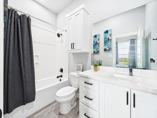 2711 Oakwood Shores Dr, Richwood, TX 77515 - full bathroom with wood finished floors, vanity, and shower / bath combination with curtain