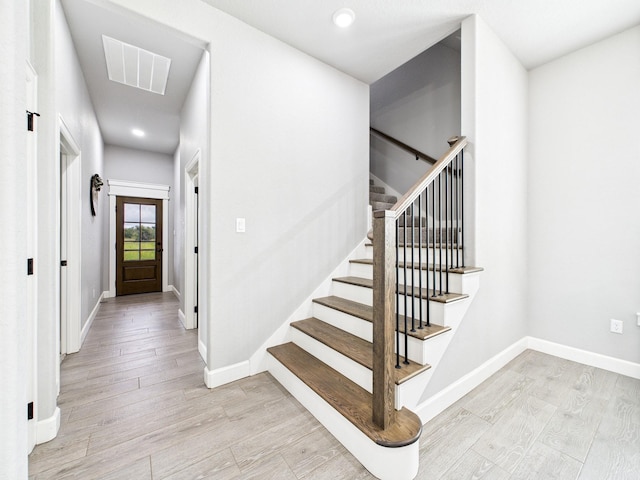 2711 Oakwood Shores Dr, Richwood, TX 77515 - entryway with stairway, light wood-style floors, and recessed lighting