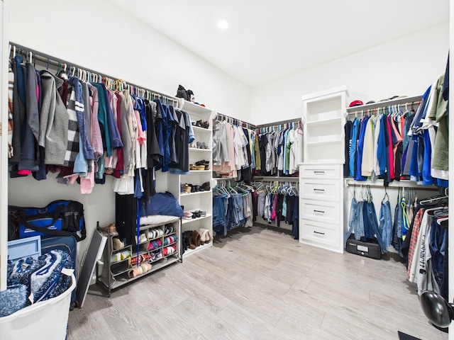 2711 Oakwood Shores Dr, Richwood, TX 77515 - walk in closet featuring light wood-type flooring