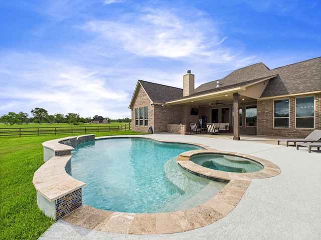 2711 Oakwood Shores Dr, Richwood, TX 77515 - view of swimming pool featuring a patio, a fenced backyard, ceiling fan, and a pool with connected hot tub