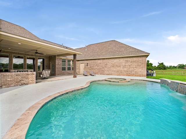 2711 Oakwood Shores Dr, Richwood, TX 77515 - view of pool with a patio, ceiling fan, and an in-ground hot tub