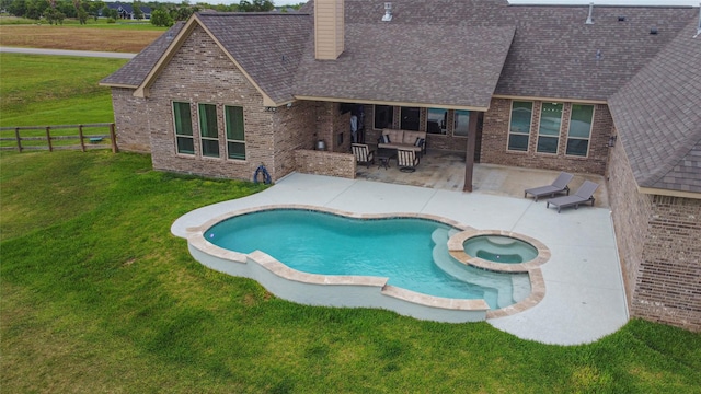 2711 Oakwood Shores Dr, Richwood, TX 77515 - view of pool with a patio and a pool with connected hot tub