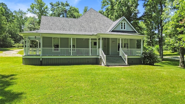 38 Darrell White Rd, Huntsville, TX 77340 - view of front of home featuring roof with shingles, a porch, and a front yard