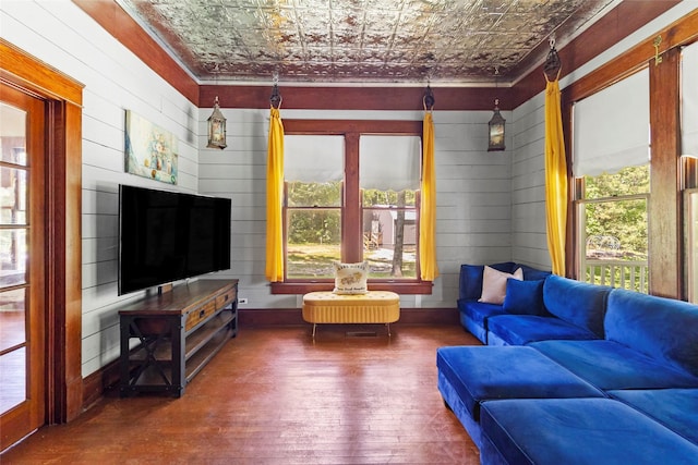 38 Darrell White Rd, Huntsville, TX 77340 - living room with an ornate ceiling, hardwood / wood-style flooring, plenty of natural light, crown molding, and wood walls