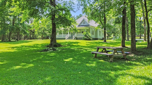38 Darrell White Rd, Huntsville, TX 77340 - view of property's community featuring a lawn