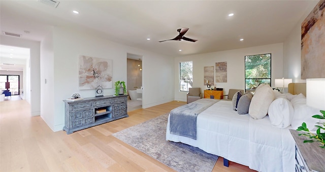5055 Yarwell Dr, Houston, TX 77096 - bedroom with light wood-style flooring, multiple windows, recessed lighting, and a ceiling fan