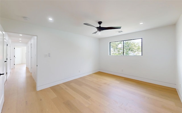 5055 Yarwell Dr, Houston, TX 77096 - empty room featuring light wood-style flooring, recessed lighting, a ceiling fan, and a smoke detector