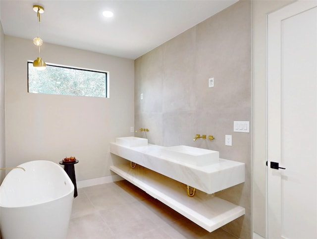 5055 Yarwell Dr, Houston, TX 77096 - full bathroom with a freestanding tub, tile patterned floors, and recessed lighting