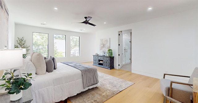 5055 Yarwell Dr, Houston, TX 77096 - bedroom with light wood-style floors, recessed lighting, and ceiling fan