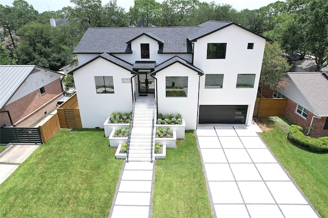 5055 Yarwell Dr, Houston, TX 77096 - modern farmhouse style home featuring stucco siding, an attached garage, driveway, and a shingled roof