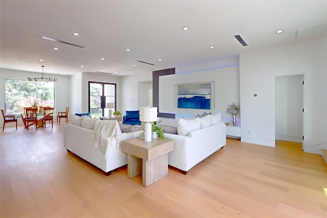 5055 Yarwell Dr, Houston, TX 77096 - living area featuring light wood-style floors and recessed lighting