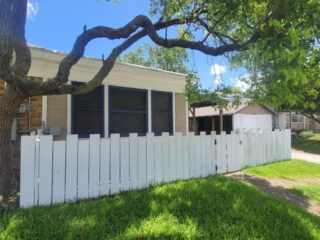 2301 45th St, Galveston, TX 77551 - view of property exterior featuring a fenced front yard