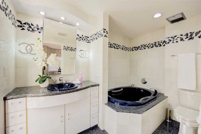2001 Holcombe Blvd Unit 206, Houston, TX 77030 - full bath with a garden tub, vanity, recessed lighting, and granite floors