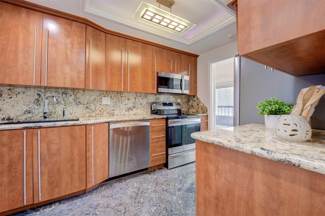 2001 Holcombe Blvd Unit 206, Houston, TX 77030 - kitchen featuring appliances with stainless steel finishes, decorative backsplash, brown cabinetry, and light stone countertops