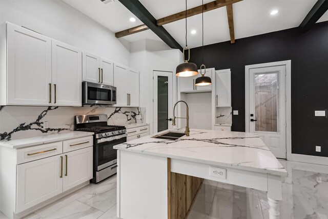 613 Melbourne St, Houston, TX 77022 - kitchen featuring appliances with stainless steel finishes, light marble finish floors, beamed ceiling, decorative backsplash, and white cabinetry
