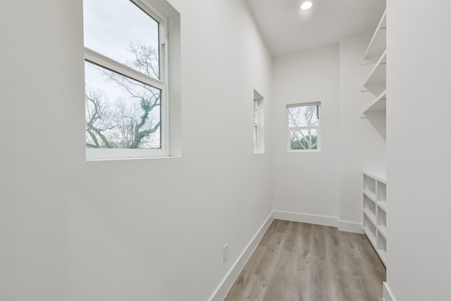 613 Melbourne St, Houston, TX 77022 - walk in closet featuring light wood-type flooring