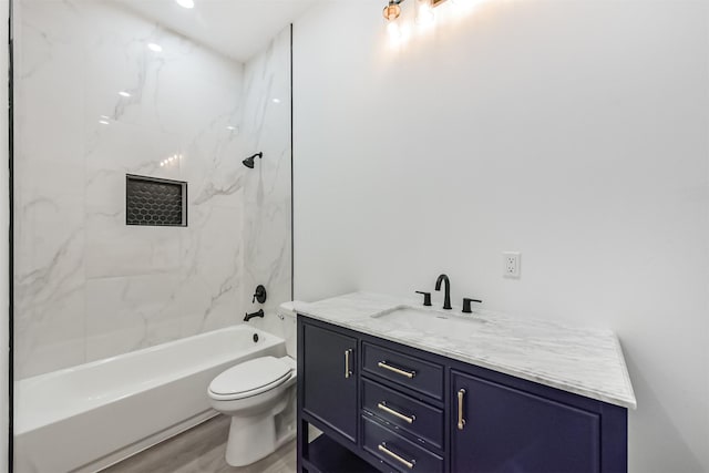 613 Melbourne St, Houston, TX 77022 - bathroom featuring vanity, wood finished floors, and  shower combination
