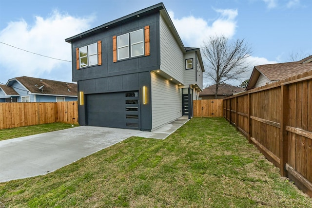 613 Melbourne St, Houston, TX 77022 - rear view of house with a garage, a fenced backyard, and a gate