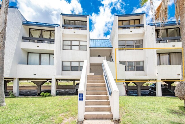 14401 Commodores Dr Unit 104, Corpus Christi, TX 78418 - view of apartment building / complex with stairs