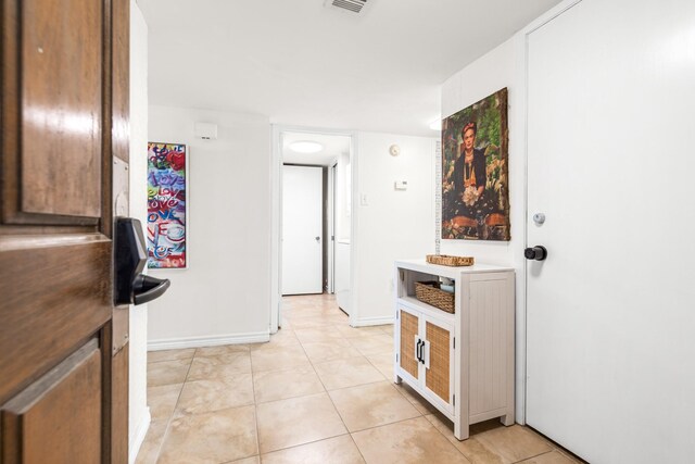 14401 Commodores Dr Unit 104, Corpus Christi, TX 78418 - corridor featuring light tile patterned floors