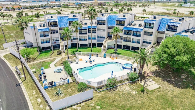 14401 Commodores Dr Unit 104, Corpus Christi, TX 78418 - drone / aerial view of a pool area