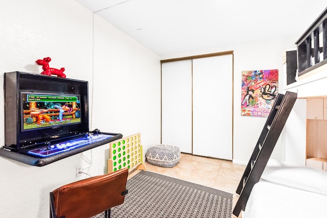 14401 Commodores Dr Unit 104, Corpus Christi, TX 78418 - tiled bedroom with a closet
